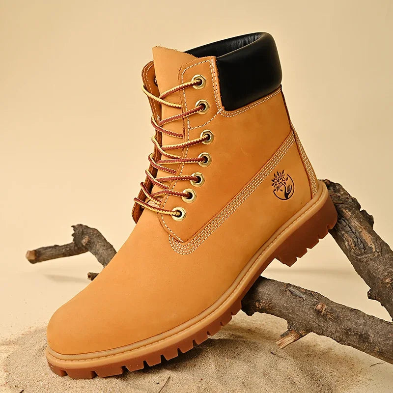Botas altas de cuero para hombre y mujer, zapatos de alta calidad, zapatillas de deporte para exteriores, botines antideslizantes con cordones para pareja