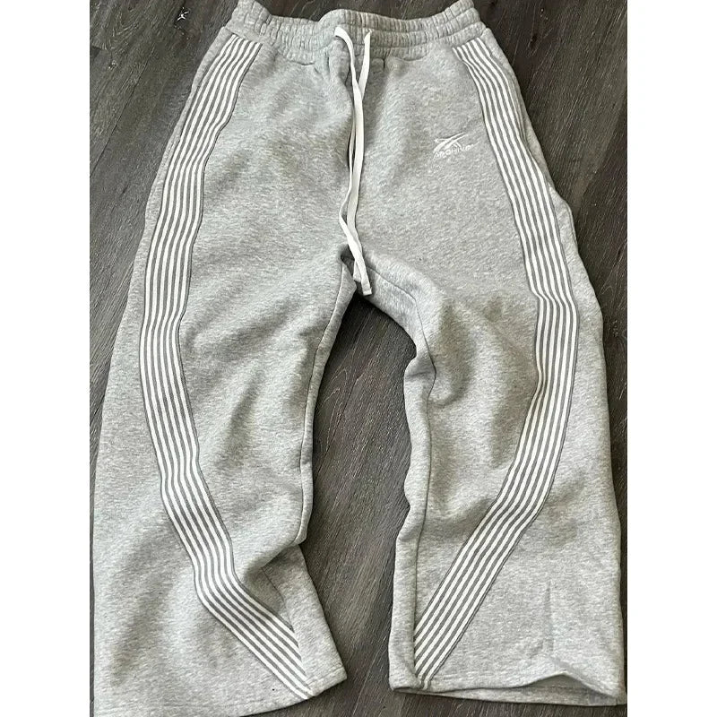 Pantalones deportivos de pierna recta holgados a rayas informales para hombre