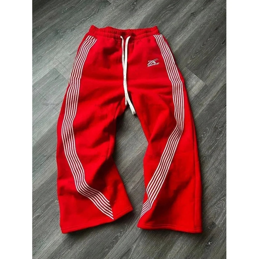 Pantalones deportivos de pierna recta holgados a rayas informales para hombre