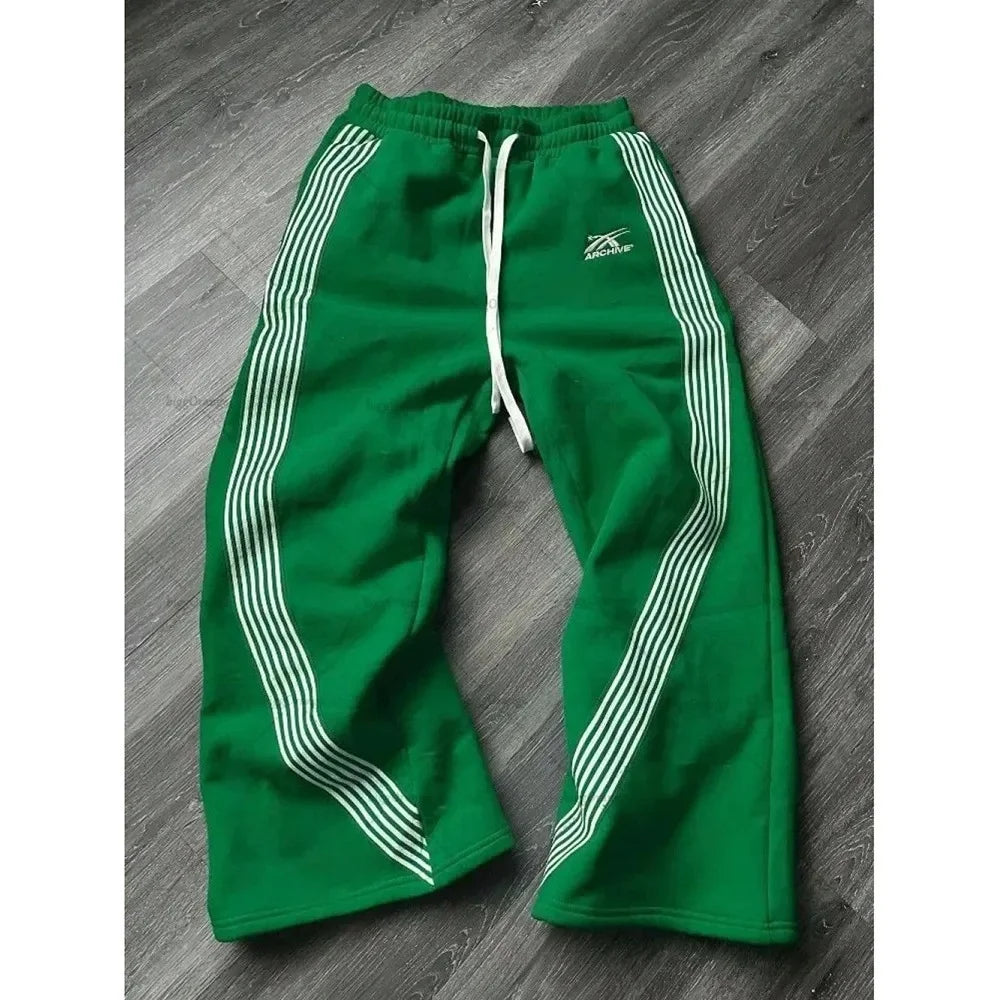 Pantalones deportivos de pierna recta holgados a rayas informales para hombre