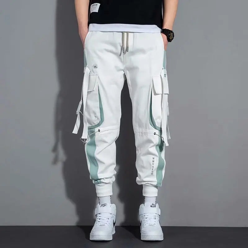 Pantalones deportivos holgados con múltiples bolsillos para primavera y verano, estilo urbano para hombre, con cordón en la cintura, pantalones cargo para fitness al aire libre.