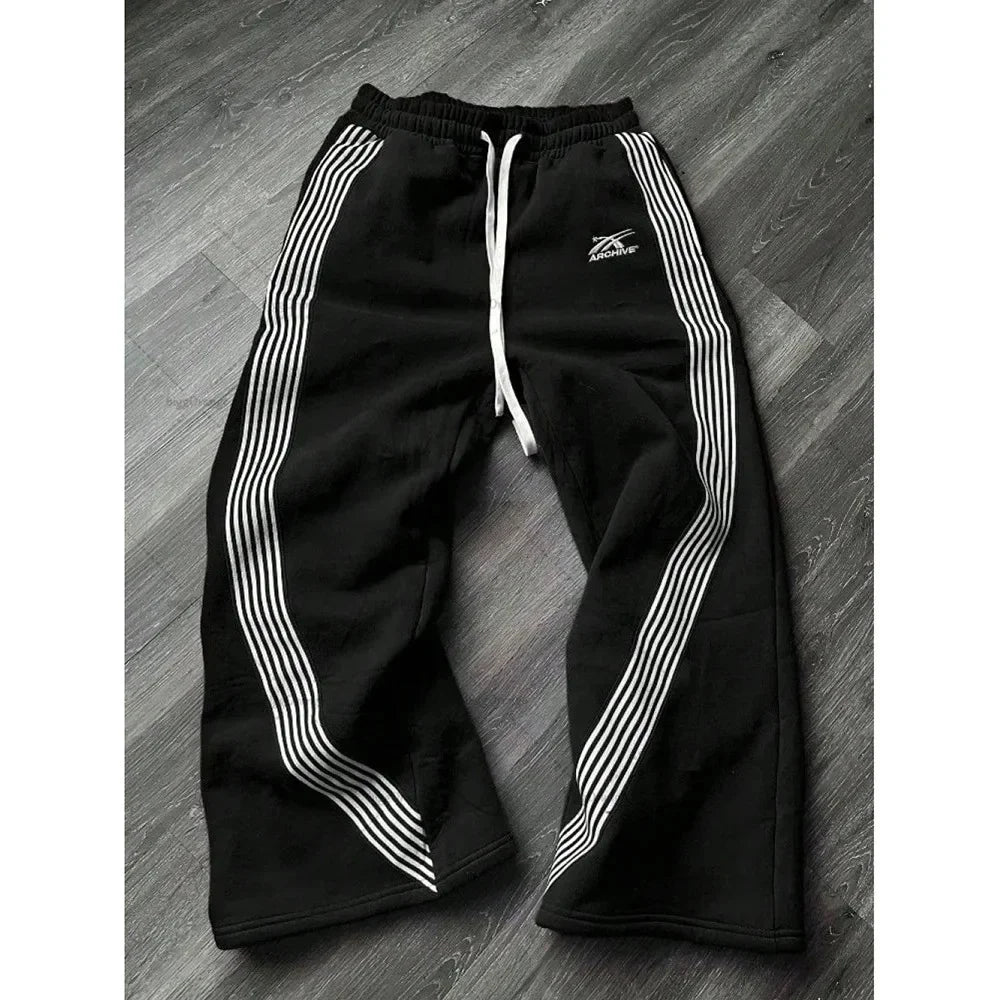 Pantalones deportivos de pierna recta holgados a rayas informales para hombre