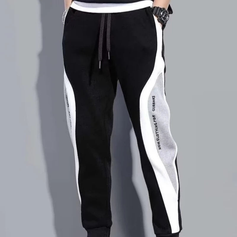 Pantalones negros para hombre, pantalones cómodos de moda, pantalones de chándal informales para hombre