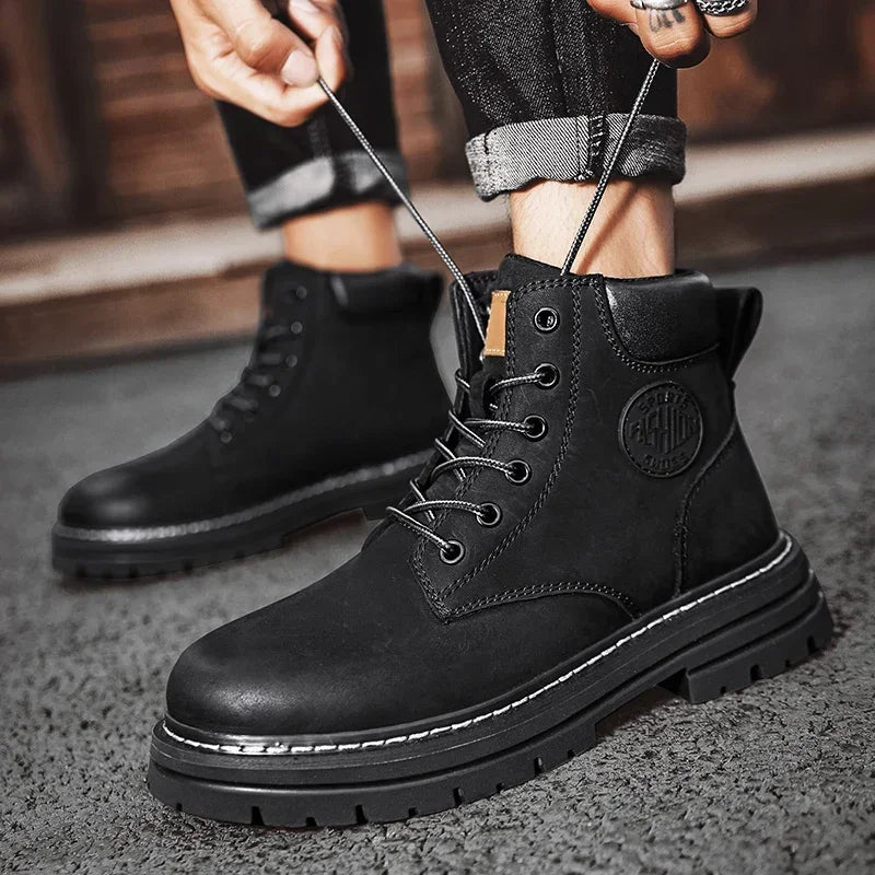 Botas altas de cuero para hombre y mujer, zapatos de alta calidad, zapatillas de deporte para exteriores, botines antideslizantes con cordones para pareja