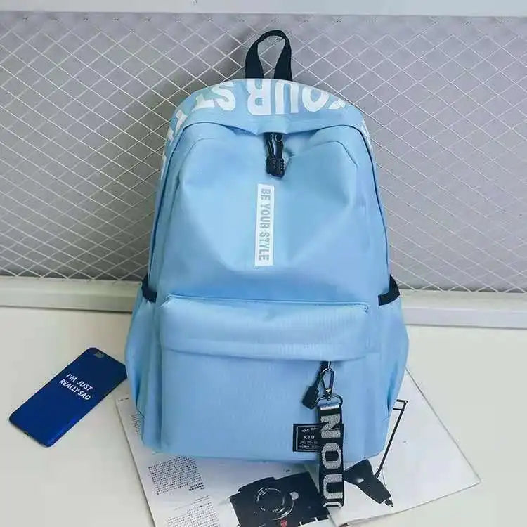 Mochila de tendencia de moda para hombres y mujeres, mochila para estudiantes de secundaria, mochila de gran capacidad