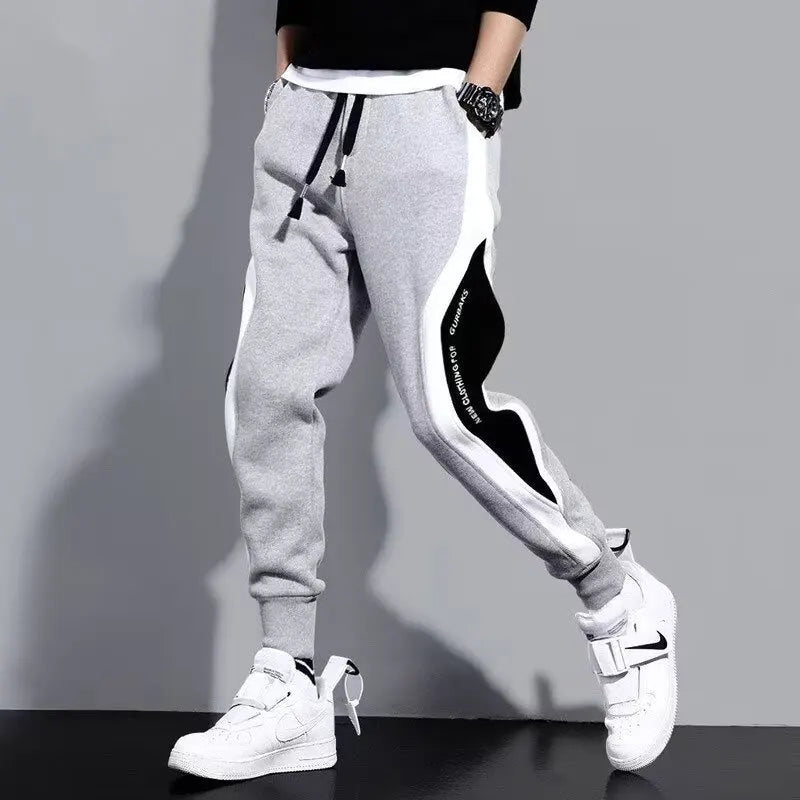 Pantalones negros para hombre, pantalones cómodos de moda, pantalones de chándal informales para hombre