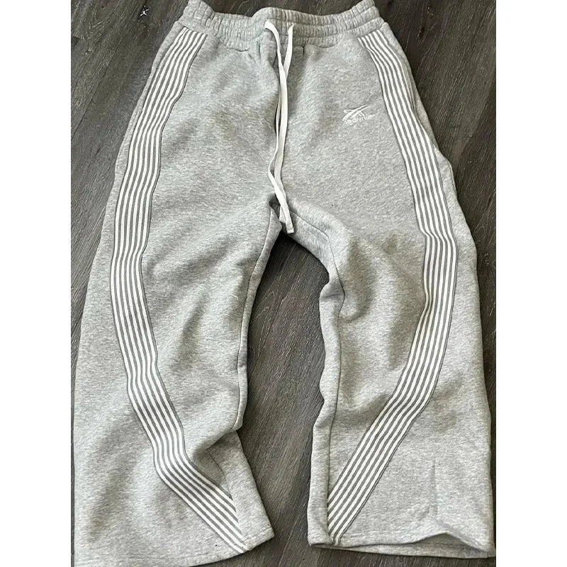 Pantalones deportivos de pierna recta holgados a rayas informales para hombre