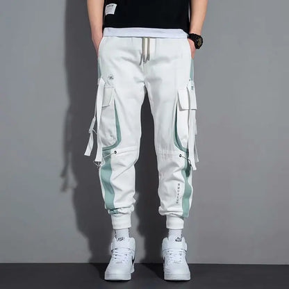 Pantalones deportivos holgados con múltiples bolsillos para primavera y verano, estilo urbano para hombre, con cordón en la cintura, pantalones cargo para fitness al aire libre.