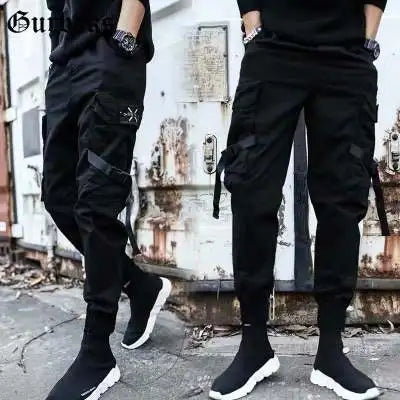 Pantalones deportivos holgados con múltiples bolsillos para primavera y verano, estilo urbano para hombre, con cordón en la cintura, pantalones cargo para fitness al aire libre.