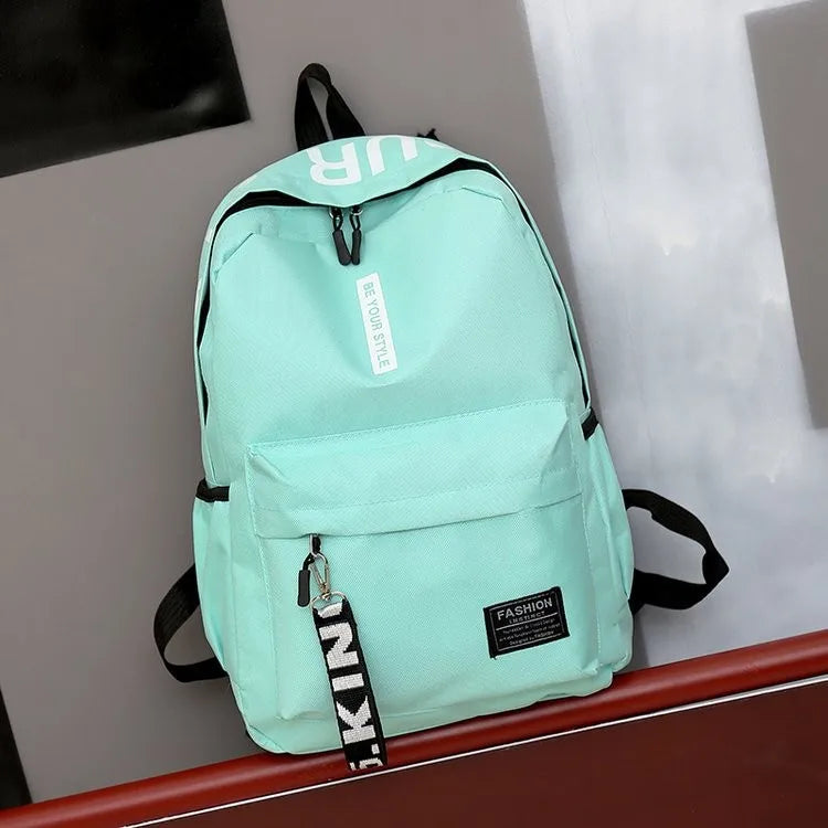 Mochila de tendencia de moda para hombres y mujeres, mochila para estudiantes de secundaria, mochila de gran capacidad
