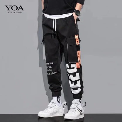 Pantalones deportivos holgados con múltiples bolsillos para primavera y verano, estilo urbano para hombre, con cordón en la cintura, pantalones cargo para fitness al aire libre.
