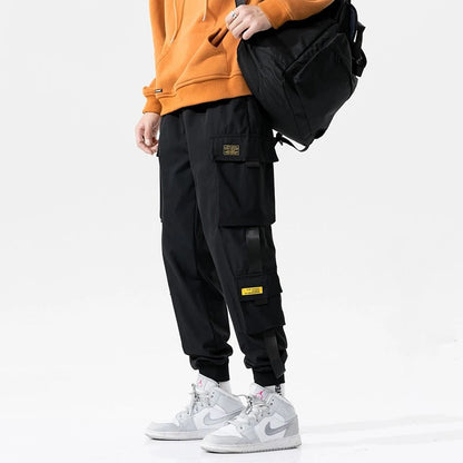 Pantalones deportivos holgados con múltiples bolsillos para primavera y verano, estilo urbano para hombre, con cordón en la cintura, pantalones cargo para fitness al aire libre.