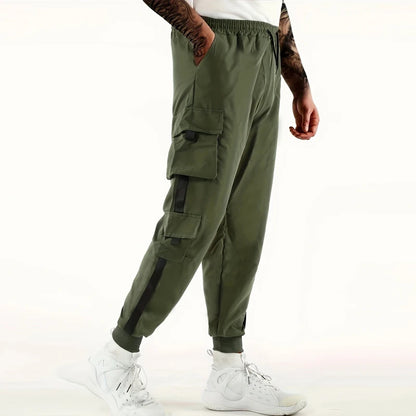Pantalones deportivos holgados con múltiples bolsillos para primavera y verano, estilo urbano para hombre, con cordón en la cintura, pantalones cargo para fitness al aire libre.