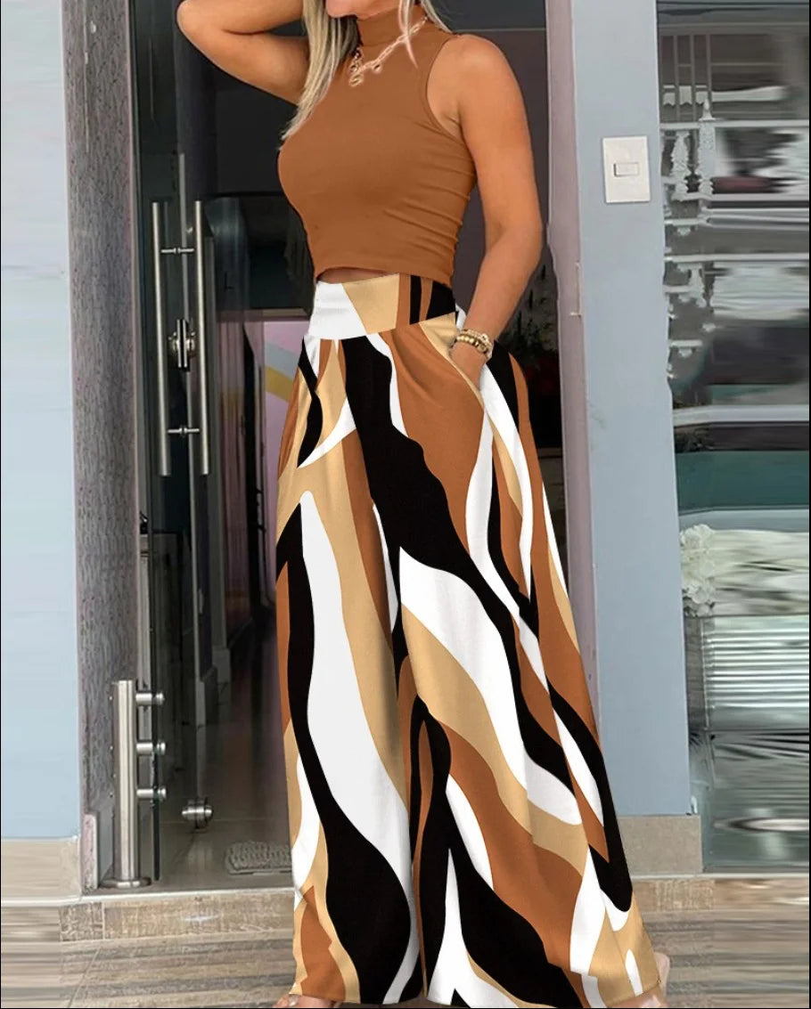 Ropa de verano para mujer. Conjunto de dos piezas con estampado de mujer, camiseta lisa sin mangas y pantalones anchos. Ropa de moda 2024.