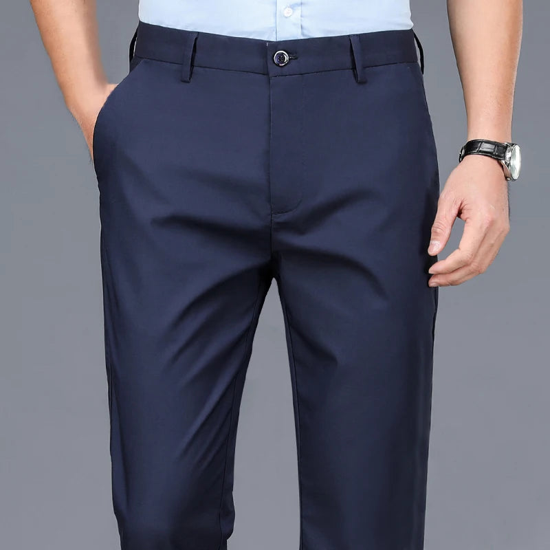 Pantalones casuales elegantes para hombre, elásticos, deportivos, de secado rápido, para primavera y otoño, rectos, de oficina, negros y azul marino.