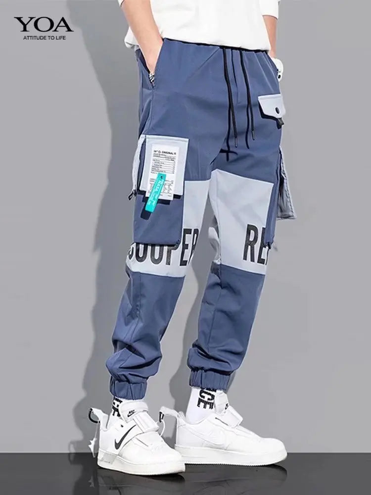 Pantalones deportivos holgados con múltiples bolsillos para primavera y verano, estilo urbano para hombre, con cordón en la cintura, pantalones cargo para fitness al aire libre.