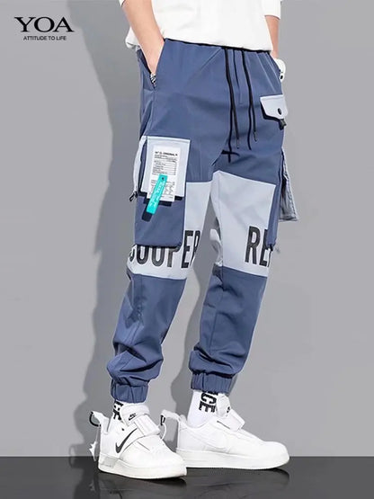 Pantalones deportivos holgados con múltiples bolsillos para primavera y verano, estilo urbano para hombre, con cordón en la cintura, pantalones cargo para fitness al aire libre.