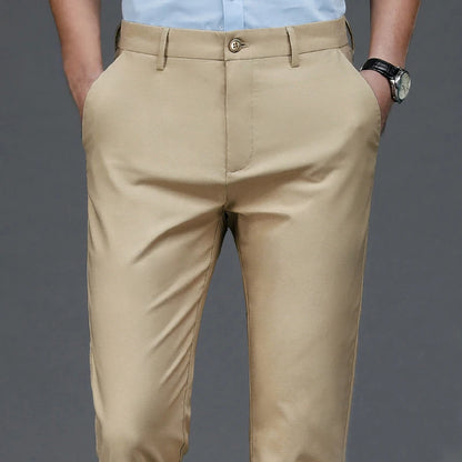 Pantalones casuales elegantes para hombre, elásticos, deportivos, de secado rápido, para primavera y otoño, rectos, de oficina, negros y azul marino.