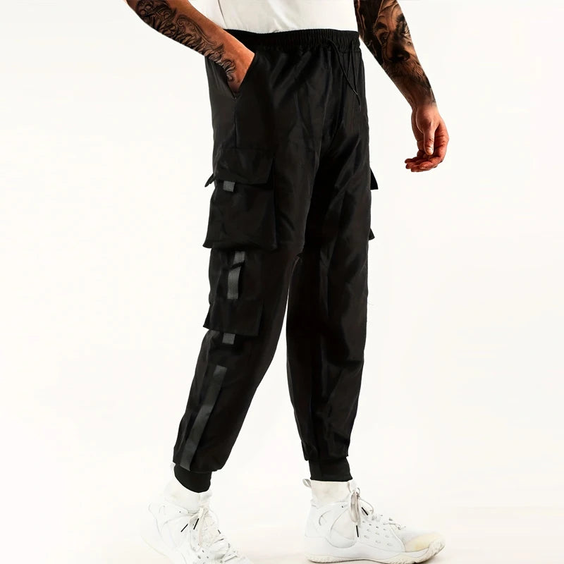 Pantalones deportivos holgados con múltiples bolsillos para primavera y verano, estilo urbano para hombre, con cordón en la cintura, pantalones cargo para fitness al aire libre.