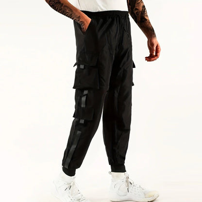 Pantalones deportivos holgados con múltiples bolsillos para primavera y verano, estilo urbano para hombre, con cordón en la cintura, pantalones cargo para fitness al aire libre.