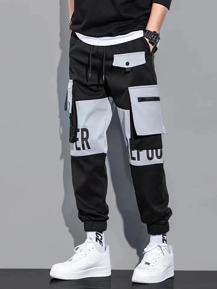 Pantalones deportivos holgados con múltiples bolsillos para primavera y verano, estilo urbano para hombre, con cordón en la cintura, pantalones cargo para fitness al aire libre.