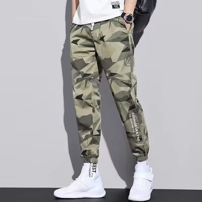Pantalones deportivos holgados con múltiples bolsillos para primavera y verano, estilo urbano para hombre, con cordón en la cintura, pantalones cargo para fitness al aire libre.