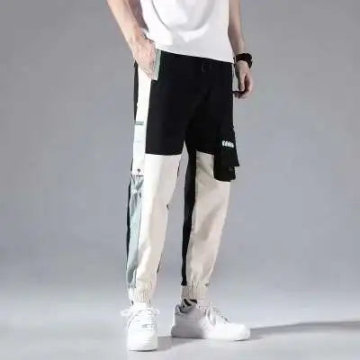 Pantalones deportivos holgados con múltiples bolsillos para primavera y verano, estilo urbano para hombre, con cordón en la cintura, pantalones cargo para fitness al aire libre.