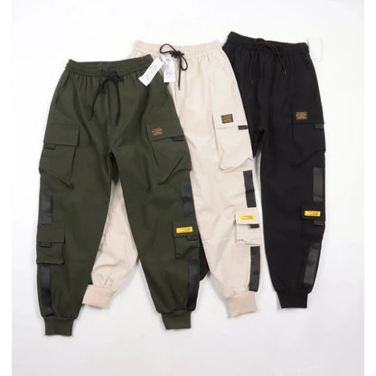 Pantalones deportivos holgados con múltiples bolsillos para primavera y verano, estilo urbano para hombre, con cordón en la cintura, pantalones cargo para fitness al aire libre.