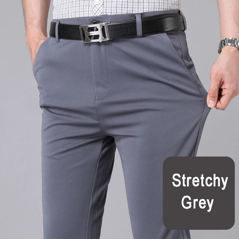 Pantalones casuales elegantes para hombre, elásticos, deportivos, de secado rápido, para primavera y otoño, rectos, de oficina, negros y azul marino.