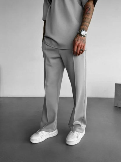 Pantalones casuales nuevos para hombre, elegantes y cómodos, con cintura elástica y cordón ajustable, de una sola línea, plisados, de color sólido, con bolsillos, pantalones de fregona