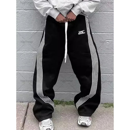 Pantalones deportivos de pierna recta holgados a rayas informales para hombre